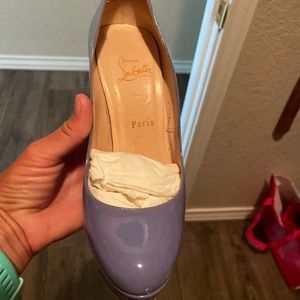 Lilac Christian Louboutin heels.